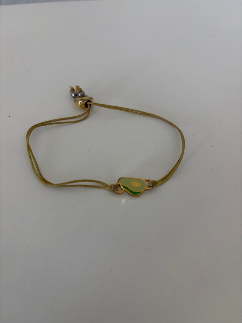 Delicate Gold-Tone Bracelet with Green Enamel Accent